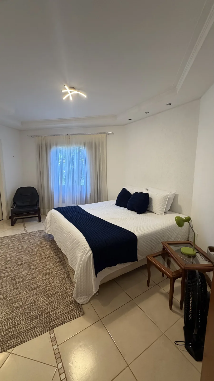 Suíte aconchegante com cama de casal